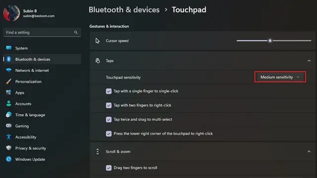 روی لیست کشویی کنار «Touchpad sensitivity» کلیک نمایید.
